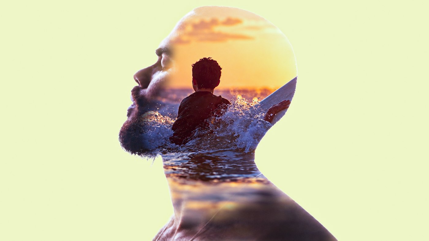 Double exposure poster of a profile filled with a surfer at sunset
